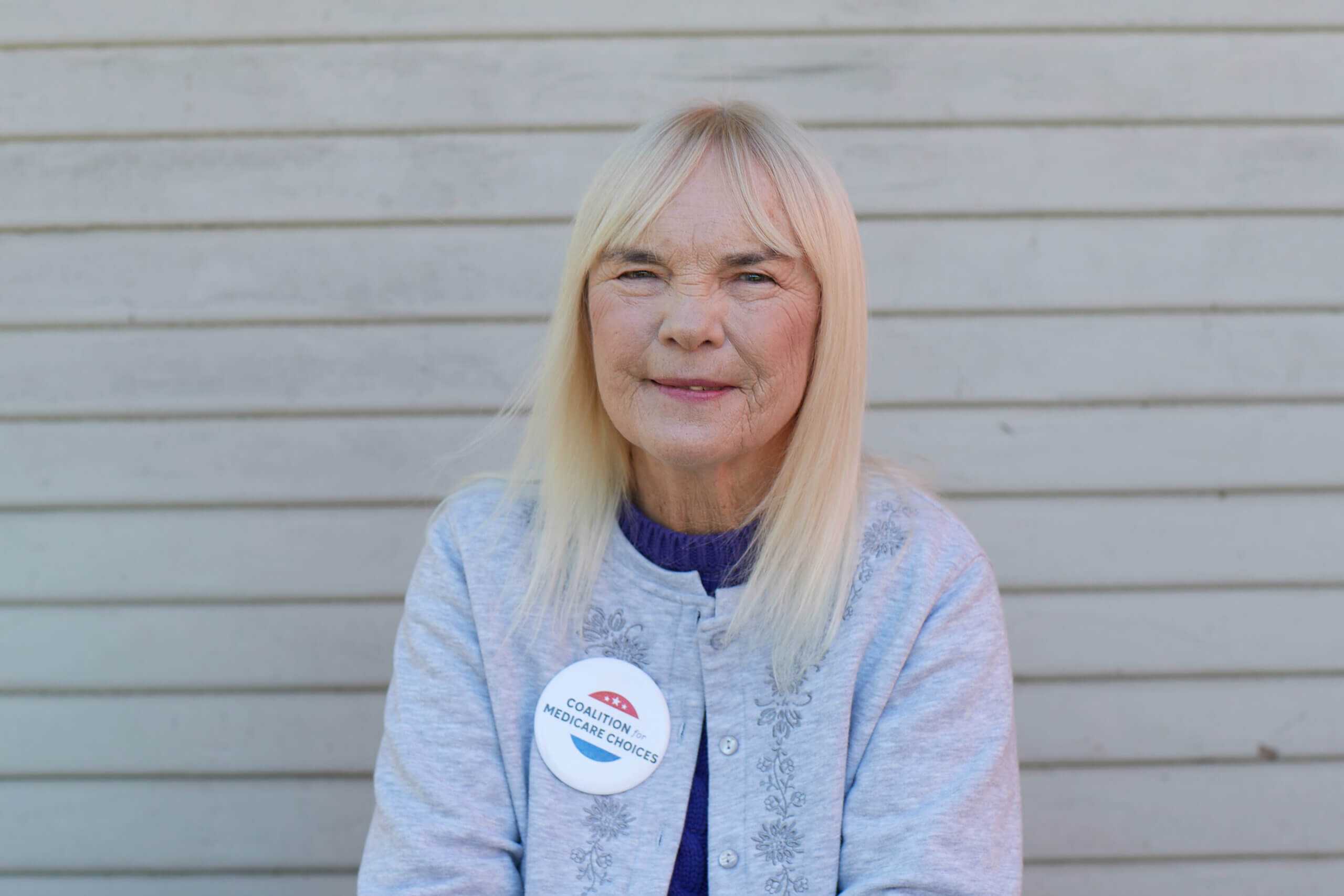 A Medicare Advantage–enrolled senior posing for the camera