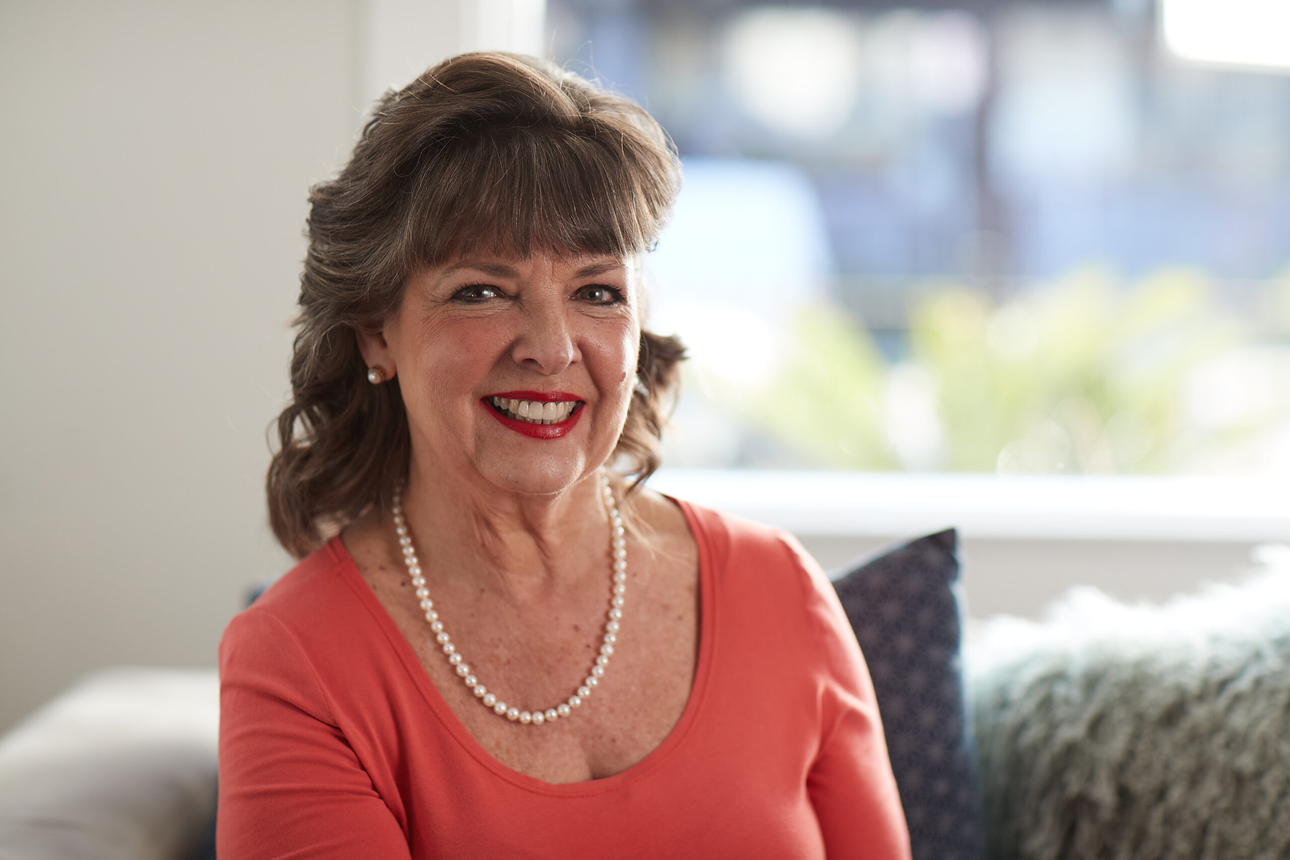 A Medicare Advantage–enrolled senior posing for the camera